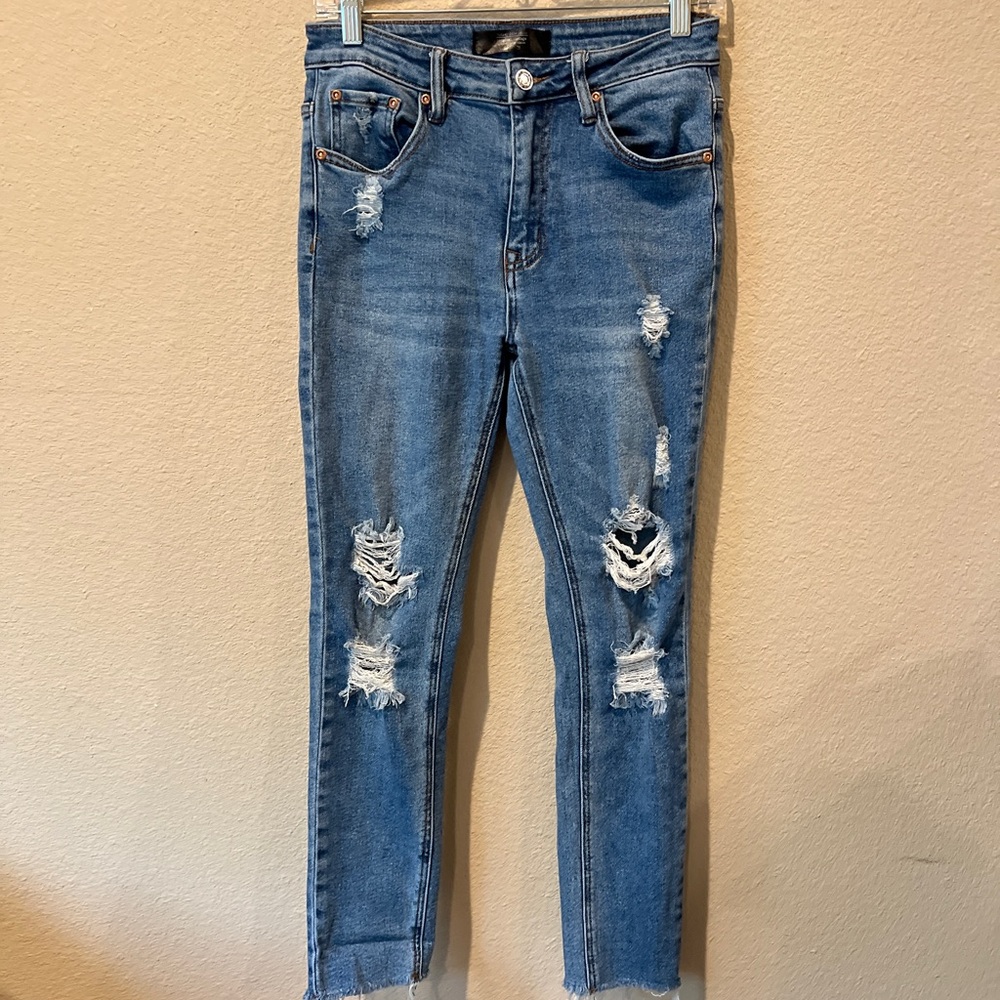 Distressed Blue Jeans